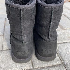 Black UGG winter boots with black fur